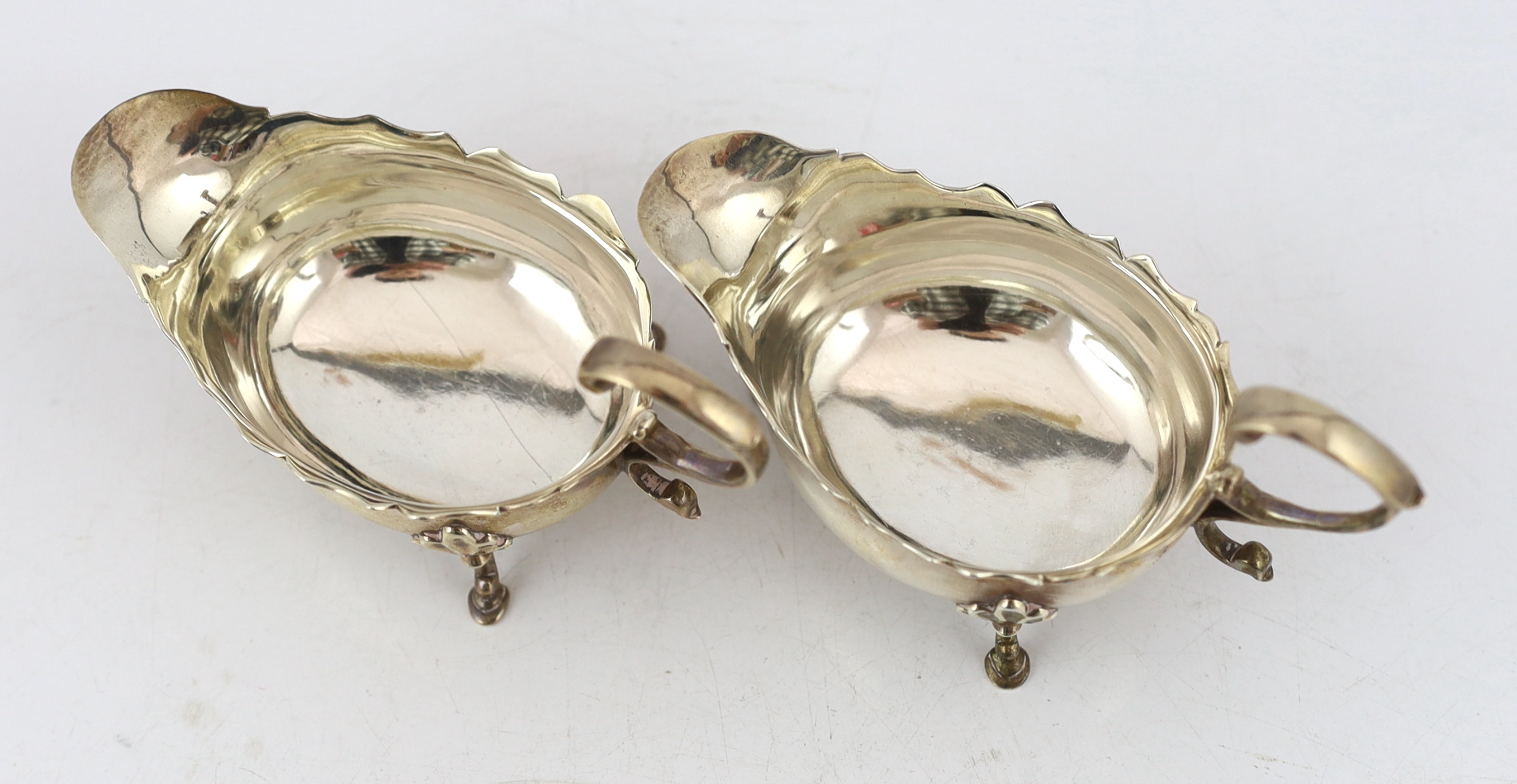 A pair of late George II silver small sauce boats, by Robert Albin Cox